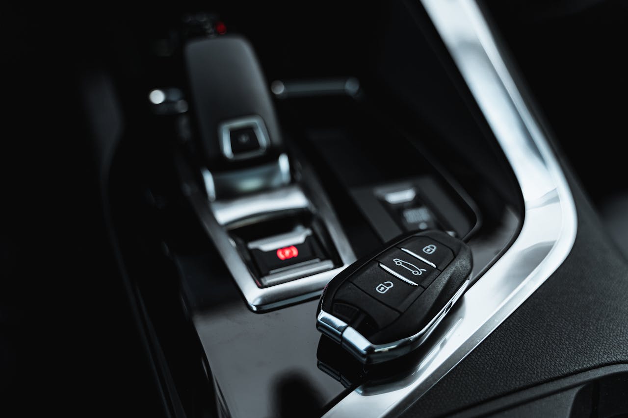 The Art of Drawing Readers In: Your attractive post title goes here Close-up of modern car interior featuring a sleek car key and shifter, showcasing luxury design.